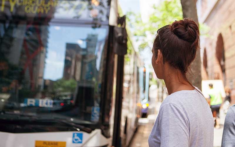 Woman waiting for the bus