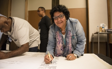 June Oscar signing Uluru Statement. Photo by Jimmy Widders Hunt