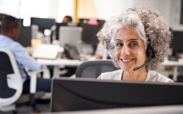 older woman on telephone help line