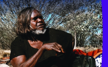 Report covering featuring woman sitting in bush