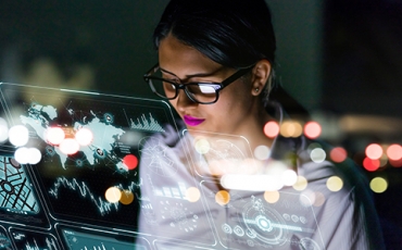 Woman looking at futuristic screen