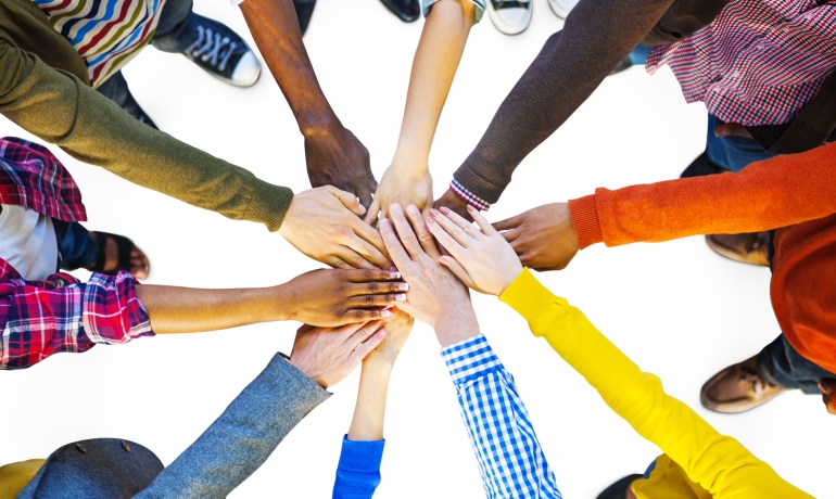 Hand shake, group of diverse multiethnic people