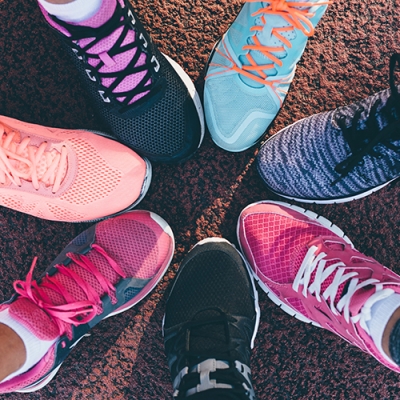 colourful range of runnning shoes in a circle