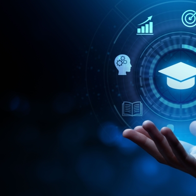 Digital education symbols float above an open hand